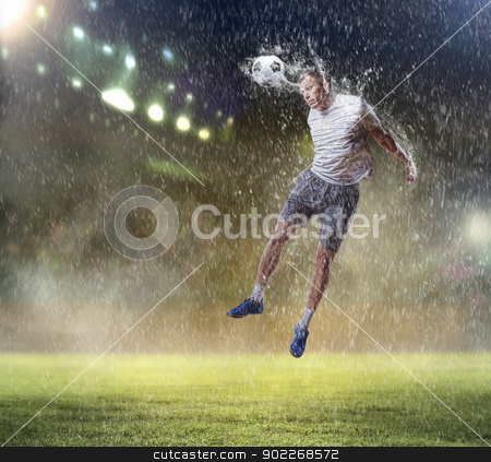 To use this stock image in your creative project, please select the size you need over to the right and click the "Add to Cart" button.
Your downloaded image will come with the Cutcaster watermark removed so don’t worry about the watermark you see on this page. football player striking the ball stock photo, football player in white shirt striking the ball with head at the stadium under the rain by Sergey Nivens