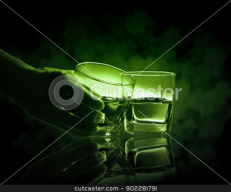 To use this stock image in your creative project, please select the size you need over to the right and click the "Add to Cart" button.
Your downloaded image will come with the Cutcaster watermark removed so don’t worry about the watermark you see on this page. Two glasses of green absinth stock photo, Hand holding one of two glasses of green absinth by Sergey Nivens
