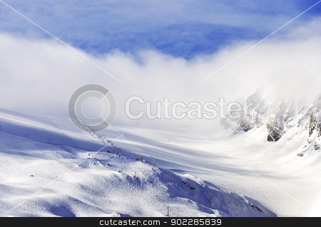 Glacier in Fog Glacier in Fog stock photo, Hintertux Glacier in Zillertal Alps in Austria in morning fog and sunrise light with ski runs, pistes and ski lifts. by Krzysztof Nahlik