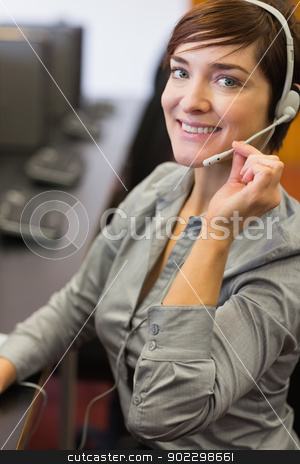 To use this stock image in your creative project, please select the size you need over to the right and click the "Add to Cart" button.
Your downloaded image will come with the Cutcaster watermark removed so don’t worry about the watermark you see on this page. Teacher sitting at the computer room wearing a headset stock photo, Teacher sitting at the computer room while wearing a headset in college by Wavebreak Media