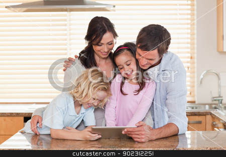 To use this stock image in your creative project, please select the size you need over to the right and click the "Add to Cart" button.
Your downloaded image will come with the Cutcaster watermark removed so don’t worry about the watermark you see on this page. Family using a tablet computer together stock photo, Family using a tablet computer together in a kitchen by Wavebreak Media