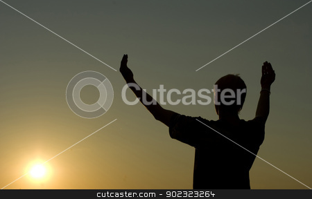 To use this stock image in your creative project, please select the size you need over to the right and click the "Add to Cart" button.
Your downloaded image will come with the Cutcaster watermark removed so don’t worry about the watermark you see on this page. prayer stock photo, A man stands on against a sun with heaved up hands by Vitaliy Pakhnyushchyy