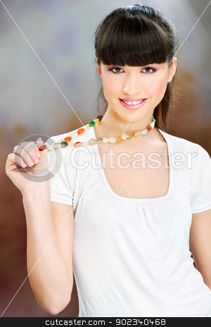 To use this stock image in your creative project, please select the size you need over to the right and click the "Add to Cart" button.
Your downloaded image will come with the Cutcaster watermark removed so don’t worry about the watermark you see on this page. Pretty woman with necklaces stock photo, Smiled woman white dressed with necklaces by iMarin