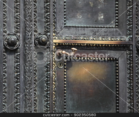 To use this stock image in your creative project, please select the size you need over to the right and click the "Add to Cart" button.
Your downloaded image will come with the Cutcaster watermark removed so don’t worry about the watermark you see on this page. ancient door stock photo, fragment of antique door with ornaments, close to by mrivserg