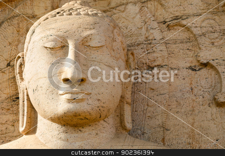 To use this stock image in your creative project, please select the size you need over to the right and click the "Add to Cart" button.
Your downloaded image will come with the Cutcaster watermark removed so don’t worry about the watermark you see on this page. Buddha face on yellow stone stock photo, Buddha face on yellow stone background, Polonnaruwa, Sri Lanka by Iryna Rasko