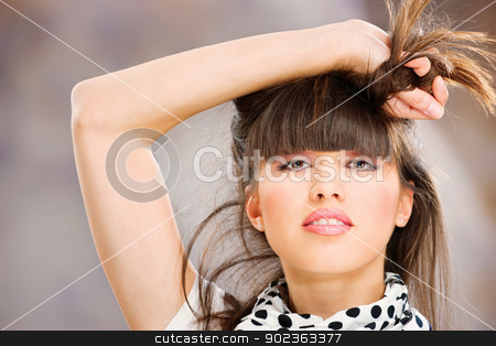 To use this stock image in your creative project, please select the size you need over to the right and click the "Add to Cart" button.
Your downloaded image will come with the Cutcaster watermark removed so don’t worry about the watermark you see on this page. Pretty woman with white scarf stock photo, Pretty woman holding her hair with one hand by iMarin