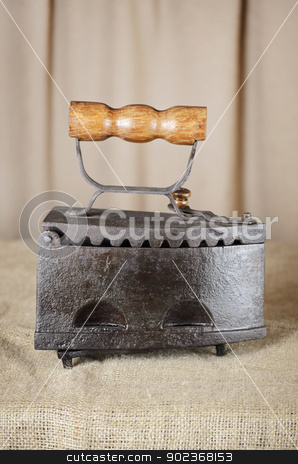 To use this stock image in your creative project, please select the size you need over to the right and click the "Add to Cart" button.
Your downloaded image will come with the Cutcaster watermark removed so don’t worry about the watermark you see on this page. Retro Iron stock photo, Retro Iron On the Canvas Against Beige Background by Sergej Razvodovskij