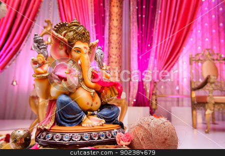 To use this stock image in your creative project, please select the size you need over to the right and click the "Add to Cart" button.
Your downloaded image will come with the Cutcaster watermark removed so don’t worry about the watermark you see on this page. Image of Ganesh at Indian wedding stock photo, Image of Ganesh on Mandap at an Indian wedding by Greg Blomberg