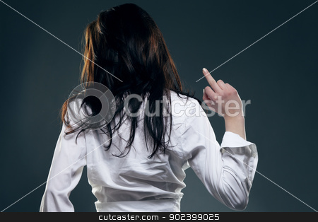 To use this stock image in your creative project, please select the size you need over to the right and click the "Add to Cart" button.
Your downloaded image will come with the Cutcaster watermark removed so don’t worry about the watermark you see on this page. young woman from back showing the middle finger stock photo, young woman from back showing the middle finger by Rob Stark