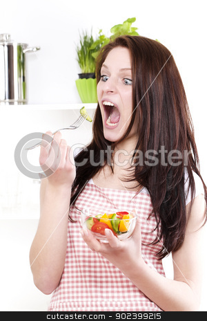 To use this stock image in your creative project, please select the size you need over to the right and click the "Add to Cart" button.
Your downloaded image will come with the Cutcaster watermark removed so don’t worry about the watermark you see on this page. funny woman with wide open mouth and eyes eating salad stock photo, funny woman with wide open mouth and eyes eating salad by Rob Stark