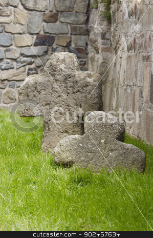To use this stock image in your creative project, please select the size you need over to the right and click the "Add to Cart" button.
Your downloaded image will come with the Cutcaster watermark removed so don’t worry about the watermark you see on this page. medieval tomb stock photo, Old medieval tomb and stone cross by Siloto