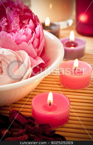 To use this stock image in your creative project, please select the size you need over to the right and click the "Add to Cart" button.
Your downloaded image will come with the Cutcaster watermark removed so don’t worry about the watermark you see on this page. Aromatherapy flowers and candles stock photo, A bowl full of beautiful pink aromatherapy flowers with candles. Spa scene. by Piccia Neri