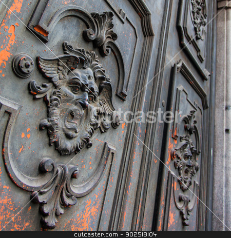 To use this stock image in your creative project, please select the size you need over to the right and click the "Add to Cart" button.
Your downloaded image will come with the Cutcaster watermark removed so don’t worry about the watermark you see on this page. Mysterious door stock photo, Gothic mask on an old wodden door in Milan - Italy by Perseomedusa