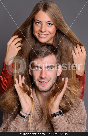 To use this stock image in your creative project, please select the size you need over to the right and click the "Add to Cart" button.
Your downloaded image will come with the Cutcaster watermark removed so don’t worry about the watermark you see on this page. portrait of young happy man and woman stock photo, Closeup portrait of young happy man and woman couple in love by andersonrise