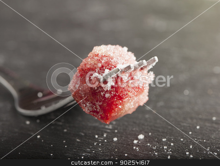 To use this stock image in your creative project, please select the size you need over to the right and click the "Add to Cart" button.
Your downloaded image will come with the Cutcaster watermark removed so don’t worry about the watermark you see on this page. Strawberry stock photo, Piece of strawberry full of sugar on a fork by Fabio Alcini