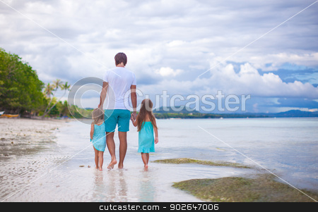To use this stock image in your creative project, please select the size you need over to the right and click the "Add to Cart" button.
Your downloaded image will come with the Cutcaster watermark removed so don’t worry about the watermark you see on this page. Rear view of father and his two little daughters walking by the sea stock photo, Rear view of father and his two little daughters walking by the sea by Dmitry Travnikov