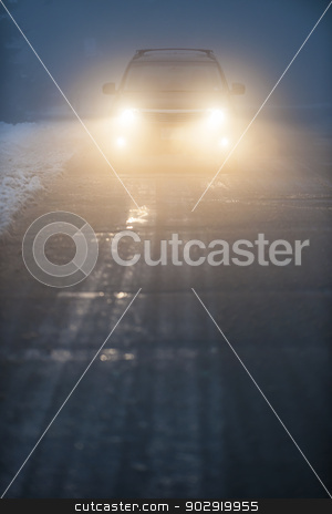 To use this stock image in your creative project, please select the size you need over to the right and click the "Add to Cart" button.
Your downloaded image will come with the Cutcaster watermark removed so don’t worry about the watermark you see on this page. Headlights of car driving in fog stock photo, Bright headlights of a car driving on foggy winter road by Elena Elisseeva