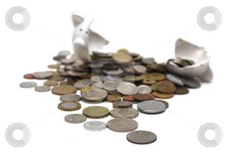 Broken Piggy Bank Broken Piggy Bank stock photo, A broken piggy bank isolated on a white background with loads of coins from around the world. by Daniel Wiedemann
