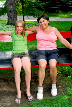 To use this stock image in your creative project, please select the size you need over to the right and click the "Add to Cart" button.
Your downloaded image will come with the Cutcaster watermark removed so don’t worry about the watermark you see on this page. Family on swings stock photo, Grandmother and granddaughter on swings by Elena Elisseeva