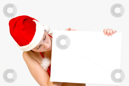 To use this stock image in your creative project, please select the size you need over to the right and click the "Add to Cart" button.
Your downloaded image will come with the Cutcaster watermark removed so don’t worry about the watermark you see on this page. Christmas helper with copy space stock photo, Girl in christmas lingerie holding up a blank sign by Frenk and Danielle Kaufmann