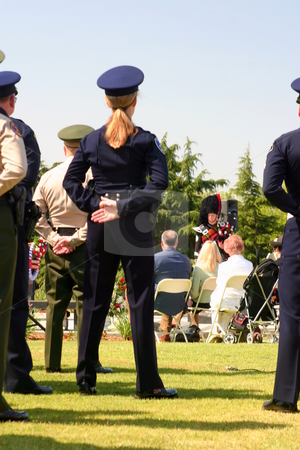Police Girl Police Girl stock photo, Peace Officer standing at parade rest. by Henrik Lehnerer
