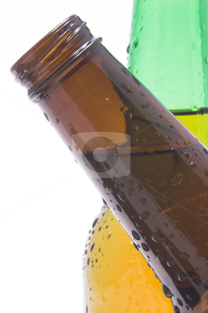 Crossing Beer Bottles Crossing Beer Bottles stock photo, A couple of beer bottles, one crossing in front of the other. by Robert Byron
