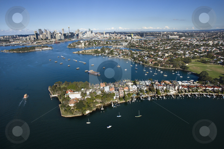 To use this stock image in your creative project, please select the size you need over to the right and click the "Add to Cart" button.
Your downloaded image will come with the Cutcaster watermark removed so don’t worry about the watermark you see on this page. Aerial of Snails Bay, Australia. stock photo, Aerial view of boats in Snails Bay with view of downtown skyline in Sydney, Australia. by Iofoto Images