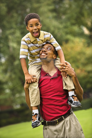 To use this stock image in your creative project, please select the size you need over to the right and click the "Add to Cart" button.
Your downloaded image will come with the Cutcaster watermark removed so don’t worry about the watermark you see on this page. Father and son bonding stock photo, Father carrying his son on his shoulders smiling and looking at eachother. by Iofoto Images