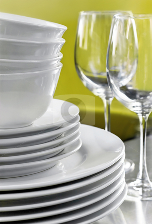 To use this stock image in your creative project, please select the size you need over to the right and click the "Add to Cart" button.
Your downloaded image will come with the Cutcaster watermark removed so don’t worry about the watermark you see on this page. Stack of Commercial White Plates Bowls & Wine Glasses stock photo, Generic stack of dishes with green background by Mark S