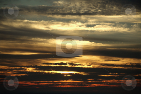 To use this stock image in your creative project, please select the size you need over to the right and click the "Add to Cart" button.
Your downloaded image will come with the Cutcaster watermark removed so don’t worry about the watermark you see on this page. Sunset through clouds. stock photo, Sunset through cloudy sky. by Iofoto Images