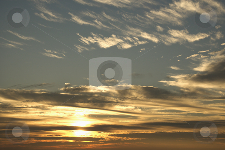 To use this stock image in your creative project, please select the size you need over to the right and click the "Add to Cart" button.
Your downloaded image will come with the Cutcaster watermark removed so don’t worry about the watermark you see on this page. Sunset sky with clouds stock photo, Sun in blue sky with clouds. by Iofoto Images