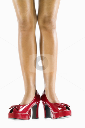To use this stock image in your creative project, please select the size you need over to the right and click the "Add to Cart" button.
Your downloaded image will come with the Cutcaster watermark removed so don’t worry about the watermark you see on this page. Woman's legs. stock photo, Studio portrait of young Caucasian woman's bare legs and red high heel shoes. by Iofoto Images