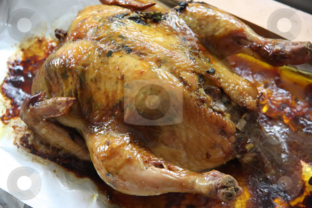 Whole roast chicken Whole roast chicken stock photo, Whole roast chicken wth stuffing in aluminum foil by Kheng Guan Toh