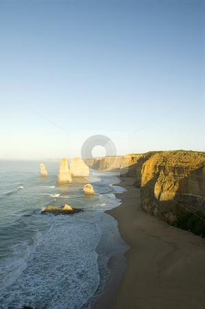 To use this stock image in your creative project, please select the size you need over to the right and click the "Add to Cart" button.
Your downloaded image will come with the Cutcaster watermark removed so don’t worry about the watermark you see on this page. The Twelve Apostles stock photo, Australia's natural wonder, The Twelve Apostles - sandstone cliffs worn away by erosion. by Lee Torrens