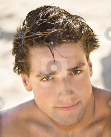To use this stock image in your creative project, please select the size you need over to the right and click the "Add to Cart" button.
Your downloaded image will come with the Cutcaster watermark removed so don’t worry about the watermark you see on this page. Handsome man. stock photo, Head and shoulder portrait of handsome man on beach. by Iofoto Images