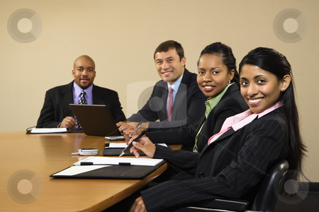 To use this stock image in your creative project, please select the size you need over to the right and click the "Add to Cart" button.
Your downloaded image will come with the Cutcaster watermark removed so don’t worry about the watermark you see on this page. Smiling businesspeople. stock photo, Businesspeople sitting at conference table smiling. by Iofoto Images