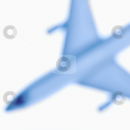 Blurred toy plane. Blurred toy plane. stock photo, Blurred model jet airplane. by Iofoto Images