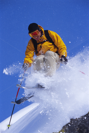 To use this stock image in your creative project, please select the size you need over to the right and click the "Add to Cart" button.
Your downloaded image will come with the Cutcaster watermark removed so don’t worry about the watermark you see on this page. Young man skiing stock photo, by Monkey Business Images