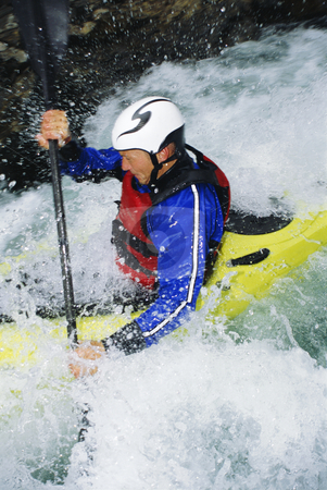 To use this stock image in your creative project, please select the size you need over to the right and click the "Add to Cart" button.
Your downloaded image will come with the Cutcaster watermark removed so don’t worry about the watermark you see on this page. Man kayaking in rapids stock photo, Man white water kayaking in rapids by Monkey Business Images