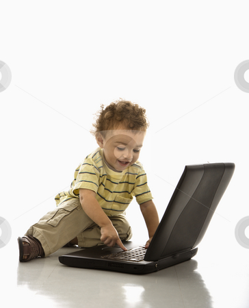 Baby on computer. Baby on computer. stock photo, Happy African American toddler boy on laptop computer. by Iofoto Images