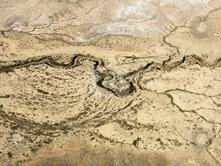 Desert and dry river. Desert and dry river. stock photo, Aerial of Colorado desert landscape with dried riverbed. by Iofoto Images
