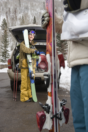 To use this stock image in your creative project, please select the size you need over to the right and click the "Add to Cart" button.
Your downloaded image will come with the Cutcaster watermark removed so don’t worry about the watermark you see on this page. Couple going skiing. stock photo, Couple standing with ski equipment by open vehicle smiling. by Iofoto Images