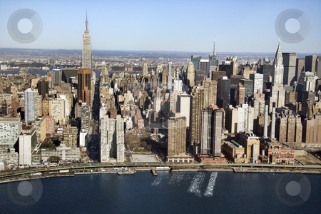 To use this stock image in your creative project, please select the size you need over to the right and click the "Add to Cart" button.
Your downloaded image will come with the Cutcaster watermark removed so don’t worry about the watermark you see on this page. Manhattan, NYC. stock photo, Aerial view of Manhattan and East River in New York City. by Iofoto Images