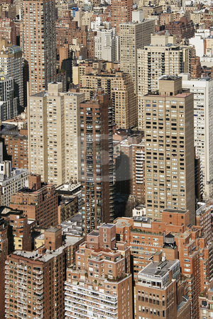 To use this stock image in your creative project, please select the size you need over to the right and click the "Add to Cart" button.
Your downloaded image will come with the Cutcaster watermark removed so don’t worry about the watermark you see on this page. New York City. stock photo, Aerial view of buildings in New York City. by Iofoto Images