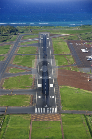 To use this stock image in your creative project, please select the size you need over to the right and click the "Add to Cart" button.
Your downloaded image will come with the Cutcaster watermark removed so don’t worry about the watermark you see on this page. Maui, Hawaii airport. stock photo, Aerial view of Maui, Hawaii airport with Pacific ocean. by Iofoto Images