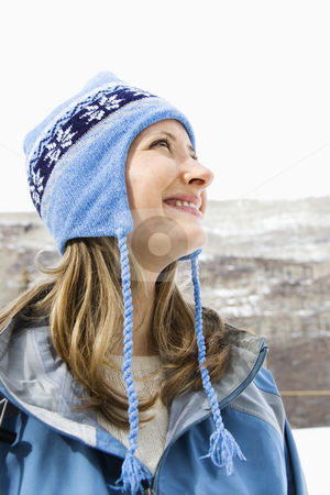 To use this stock image in your creative project, please select the size you need over to the right and click the "Add to Cart" button.
Your downloaded image will come with the Cutcaster watermark removed so don’t worry about the watermark you see on this page. Attractive woman. stock photo, Side view head and shoulder of attractive smiling mid adult Caucasian blond woman wearing blue ski clothing. by Iofoto Images