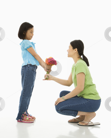 To use this stock image in your creative project, please select the size you need over to the right and click the "Add to Cart" button.
Your downloaded image will come with the Cutcaster watermark removed so don’t worry about the watermark you see on this page. Girl giving mother flowers. stock photo, Asian girl handing bouquet of flowers to her mother. by Iofoto Images