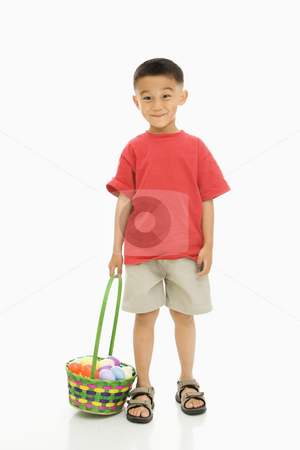 To use this stock image in your creative project, please select the size you need over to the right and click the "Add to Cart" button.
Your downloaded image will come with the Cutcaster watermark removed so don’t worry about the watermark you see on this page. Boy with Easter basket. stock photo, Asian boy standing against white background holding Easter basket. by Iofoto Images