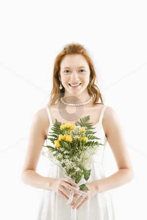 To use this stock image in your creative project, please select the size you need over to the right and click the "Add to Cart" button.
Your downloaded image will come with the Cutcaster watermark removed so don’t worry about the watermark you see on this page. Bride holding bouquet. stock photo, Portrait of Caucasian bride holding bouquet. by Iofoto Images