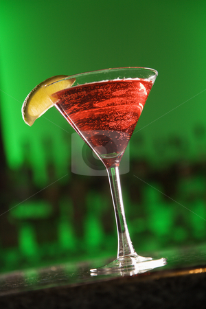 To use this stock image in your creative project, please select the size you need over to the right and click the "Add to Cart" button.
Your downloaded image will come with the Cutcaster watermark removed so don’t worry about the watermark you see on this page. Martini cocktail. stock photo, Still life of martini cocktail with fruit garnish against glowing green background. by Iofoto Images